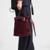 Prada Buckle Belted Suede Bucket Bag