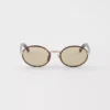 Prada Sunglasses with the Iconic Metal Plaque