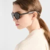 Prada Sunglasses with the Iconic Metal Plaque