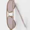 Prada Sunglasses with the Iconic Metal Plaque
