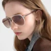 Prada Sunglasses with the Iconic Metal Plaque