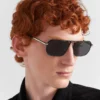 Sunglasses with Iconic Metal Plaque